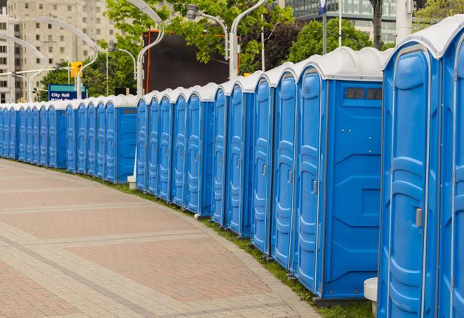 a row of sleek and modern portable restrooms at a special outdoor event in Huntingdon Valley